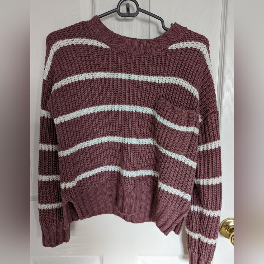 Pink sweater with white stripes